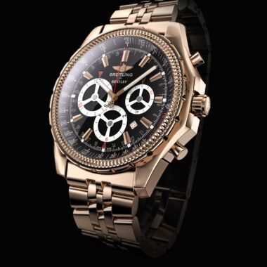 3D rendered Breitling for Bentley gold chronograph watch with black dial and metal bracelet, created by Digital Imaging Group